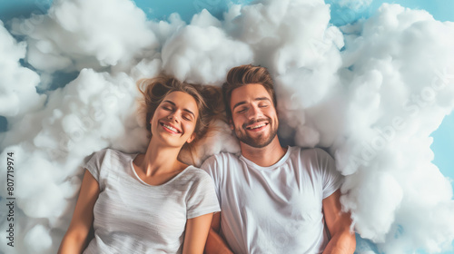 A man and a woman laying in a relaxed position on a cloud made of cotton.