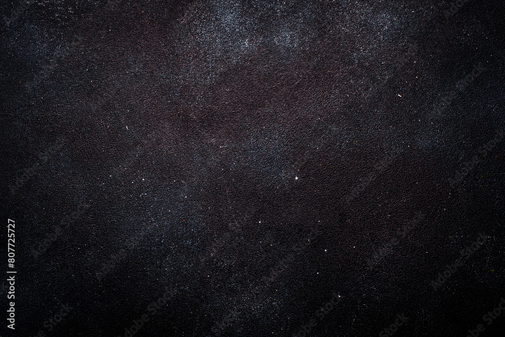 Black painted concrete texture or background with shadow and grain elements. High contrast and resolution image with place for text. Template for design Black painted concrete texture or background with shadow and grain elements. High contrast and resolution image with place for text. Template for design
