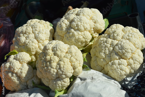 a box of cauliflower. vegetables on the market, sale of healthy food, vitamins. background for the design.