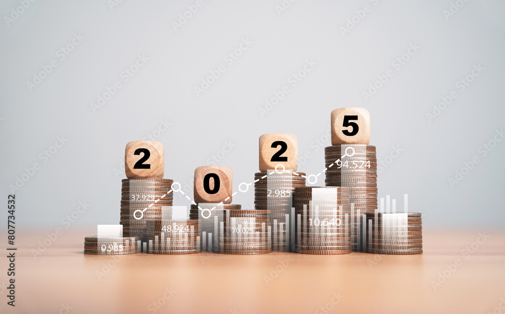 2025 Year on the top of coins stacking for financial plan in new year include budget tax investment saving concept. 2025 Year on the top of coins stacking for financial plan in new year include budget tax investment saving concept.