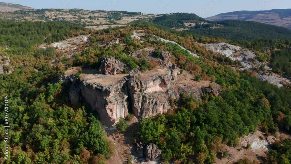 Harman Kaya Thracian Megalithic Site On Mountains Of Rhodope In Bulgaria. aerial orbiting shot Harman Kaya Thracian Megalithic Site On Mountains Of Rhodope In Bulgaria. aerial orbiting shot