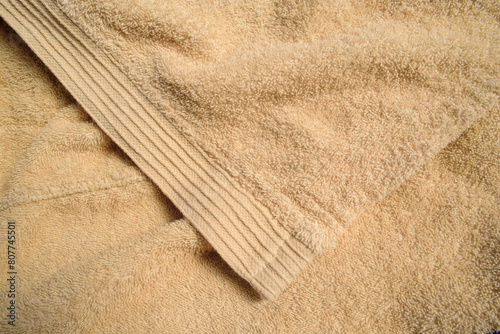Rayas en relieve en tira decorativa de toalla beige photo