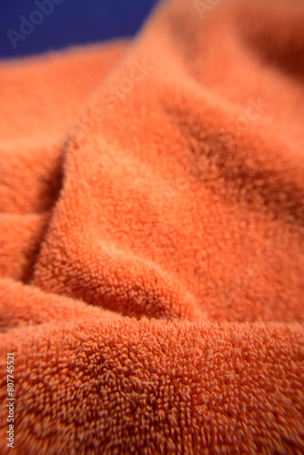 Detalle de toalla naranja gastada photo