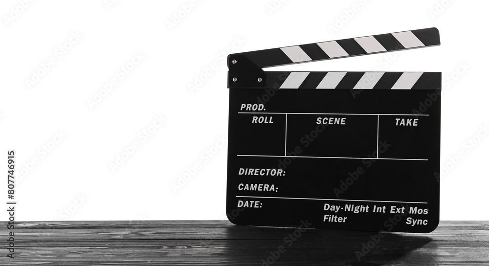 Obraz premium Movie clapper on wooden table against white background, space for text