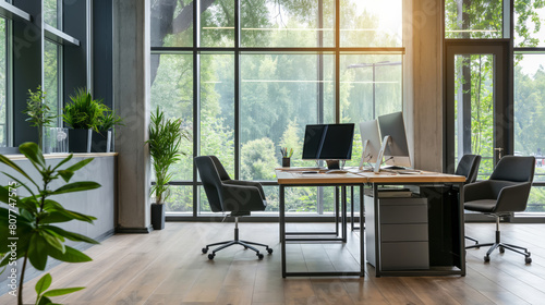 A view of a modern office space featuring a desk, chairs, and a large window.
