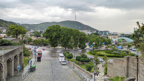 Georgia Tbilisi rainy day overlooking European  square and green park