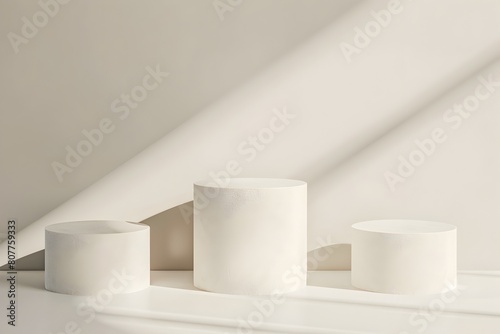 Three Clean and Minimal White Cylindrical Podiums for Product Showcase
