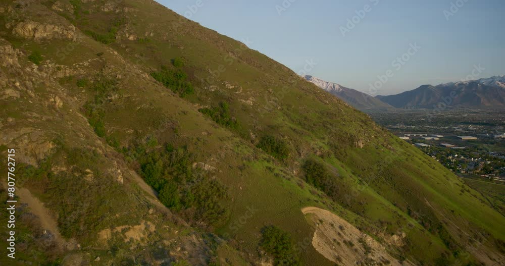 Sunset glow on mountain side - majestic aerial shot