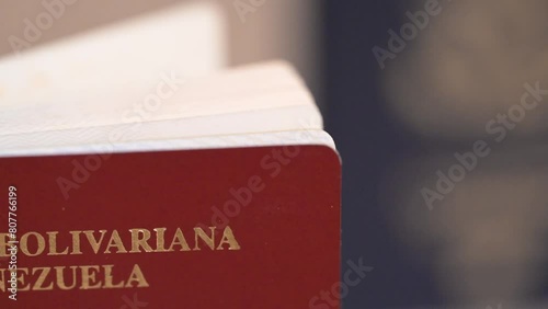 Macro of Venezuelan and US passports, from alien to US citizen photo