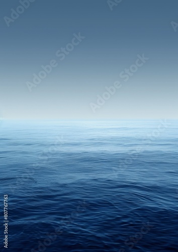 A calm blue ocean with a clear sky above