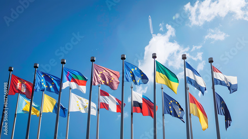 flags of european union countries with flagstaffs all in one line photo