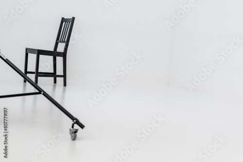 Empty wooden classic black chair on white background in photo studio