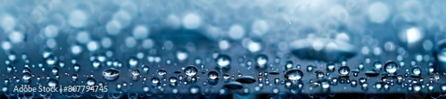 Macro View of Water Droplets on Blue Surface Close-up photo