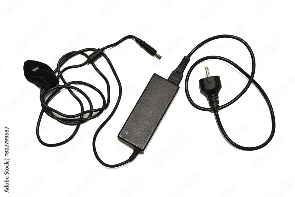 The laptop power supply assembly lies on a white background.