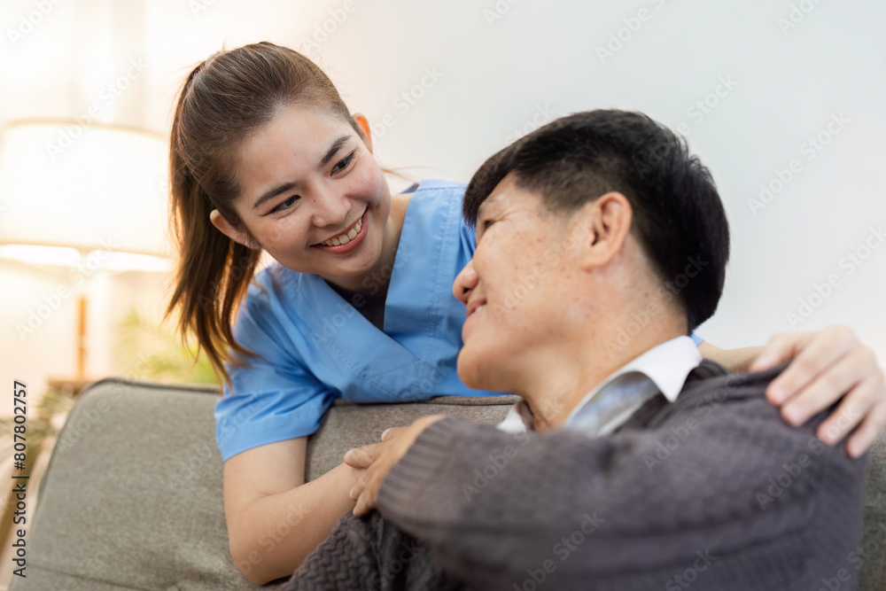elderly touch hand on back of hand caregiver or nurses to express thankful elderly touch hand on back of hand caregiver or nurses to express thankful