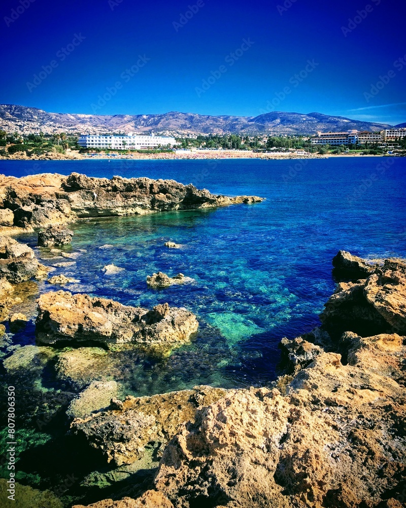 View of the Coral Bay with blue water of Mediterranean Sea, Pégeia, Paphos, Cyprus, October 2018 View of the Coral Bay with blue water of Mediterranean Sea, Pégeia, Paphos, Cyprus, October 2018