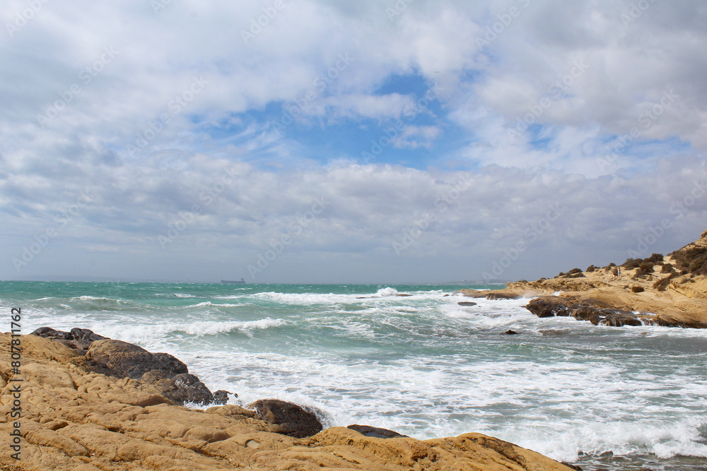 natural background of sea sky and stones, beautiful view of Mediterranean coast in Spain, waves in the sea natural background of sea sky and stones, beautiful view of Mediterranean coast in Spain, waves in the sea
