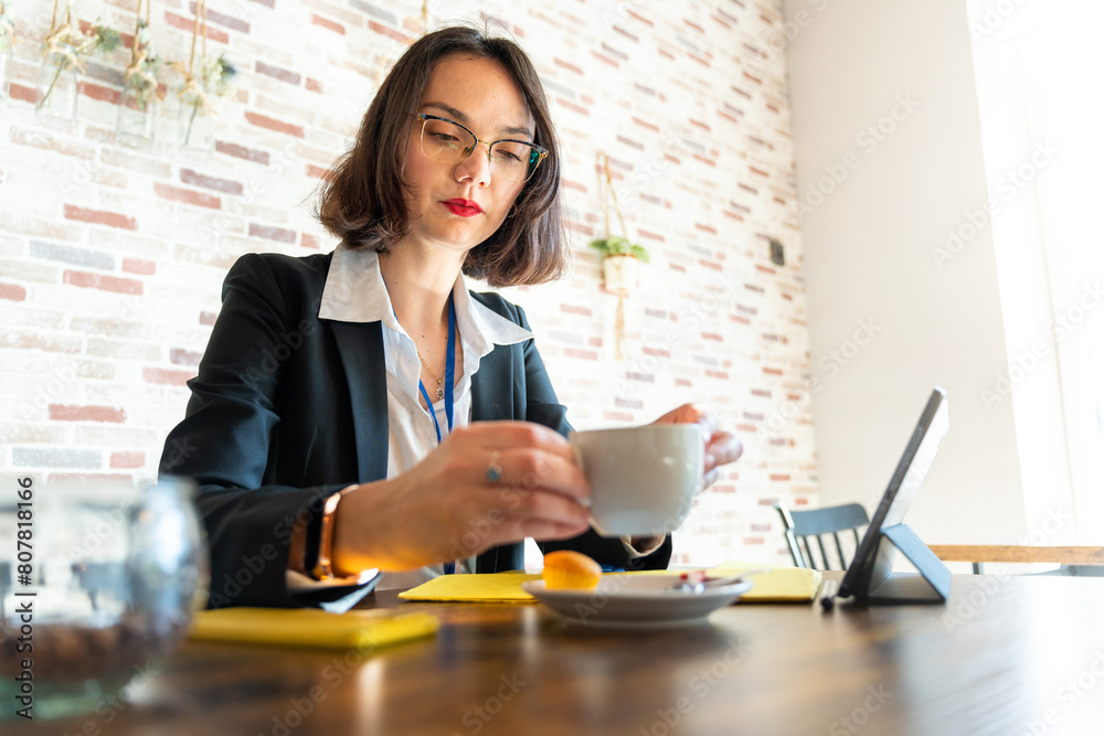 Romanian businesswoman taking a break at work Romanian businesswoman taking a break at work