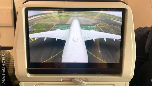 Outside Aircraft Camera Playing on Inside Screen DIsplay During Flight Inside Aircraft photo