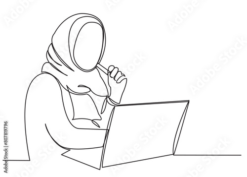 A Muslim woman works