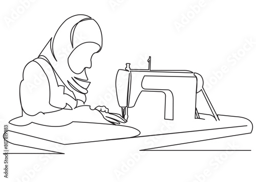 Muslim girl sews