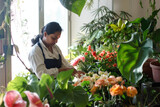 Candid style photo of South Asian florist tending to plants and flowers, natural lighting