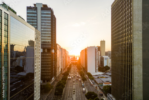 Presidente Vargas Avenue in Rio de Janeiro City Downtown by Sunrise With Candelaria Church at the End and Office Buildings on Both Sides photo
