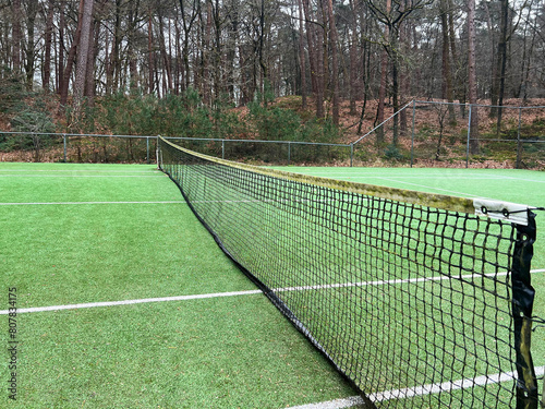 Wallpaper Mural Tennis court with artificial grass and net outdoors Torontodigital.ca