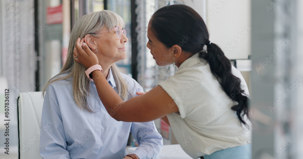 Optometrist, senior patient and help for glasses at shop with assistance, support and option for health care. Women, optometry and eyewear store with prescription assessment, vision and consultation