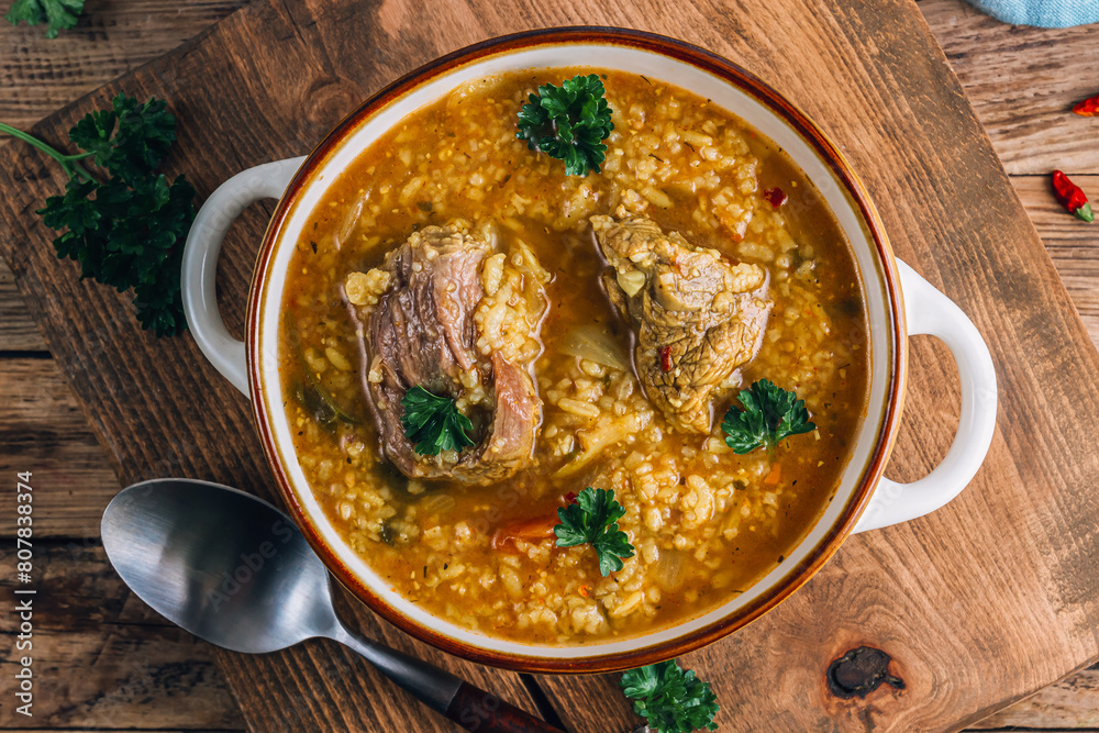 Traditional Georgian soup Kharcho with meat and rice Traditional Georgian soup Kharcho with meat and rice