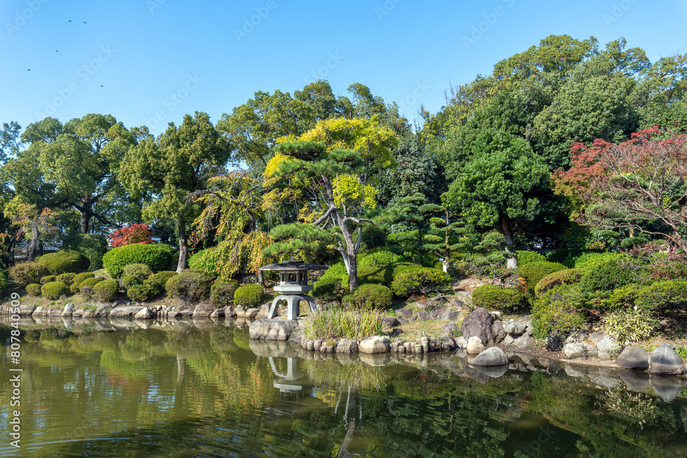 Beautiful calm scene in spring Japanese garden in osaka, Japan Beautiful calm scene in spring Japanese garden in osaka, Japan