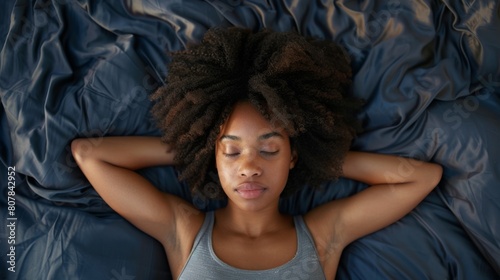 Woman Resting Peacefully in Bed