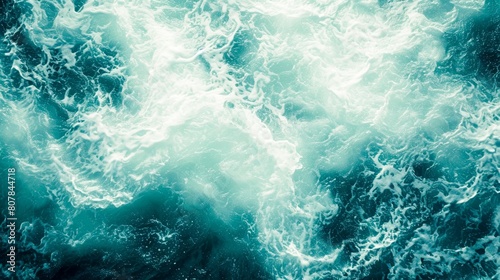 Turquoise blue sea with white foam on texture background.