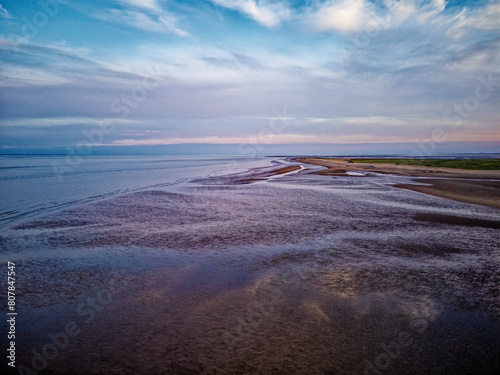 Wallpaper Mural Coastal sunset scene. Aerial photograph showing tidal channels flowing through sand dunes. Lincolnshire Coast, Gibraltar Point. Summer evening sunset Torontodigital.ca