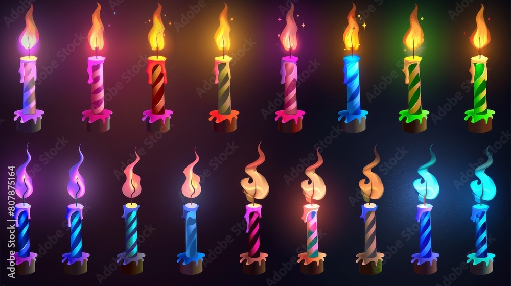 Candles glowing on a birthday cake isolated on a black background with ...