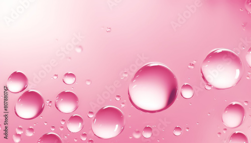 Pink water droplets with a pink background