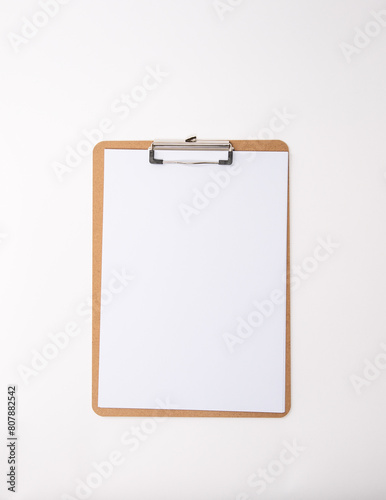 Wooden clipboard with blank white paper mock up