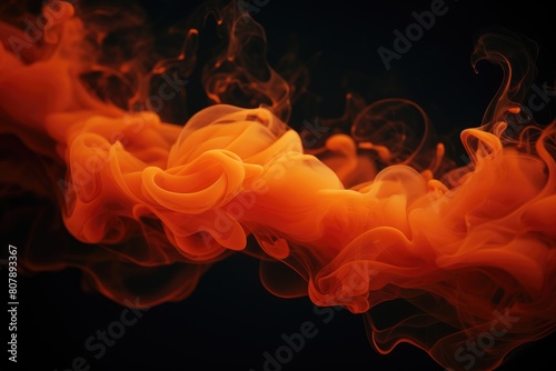 Orange smoke on black background. Color smoke. Water splash. Cosmic stardust. © Marat