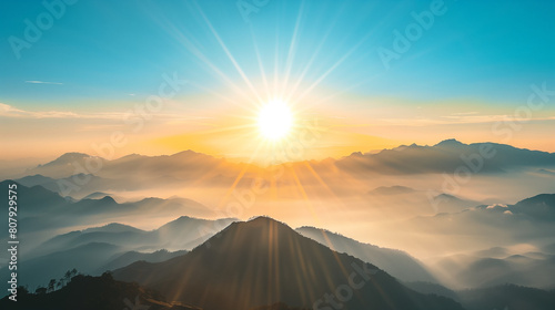Sunrise Splendor Over Misty Mountains lands