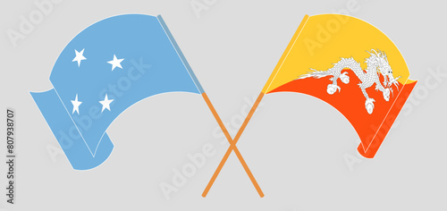 Crossed and waving flags of Micronesia and Bhutan