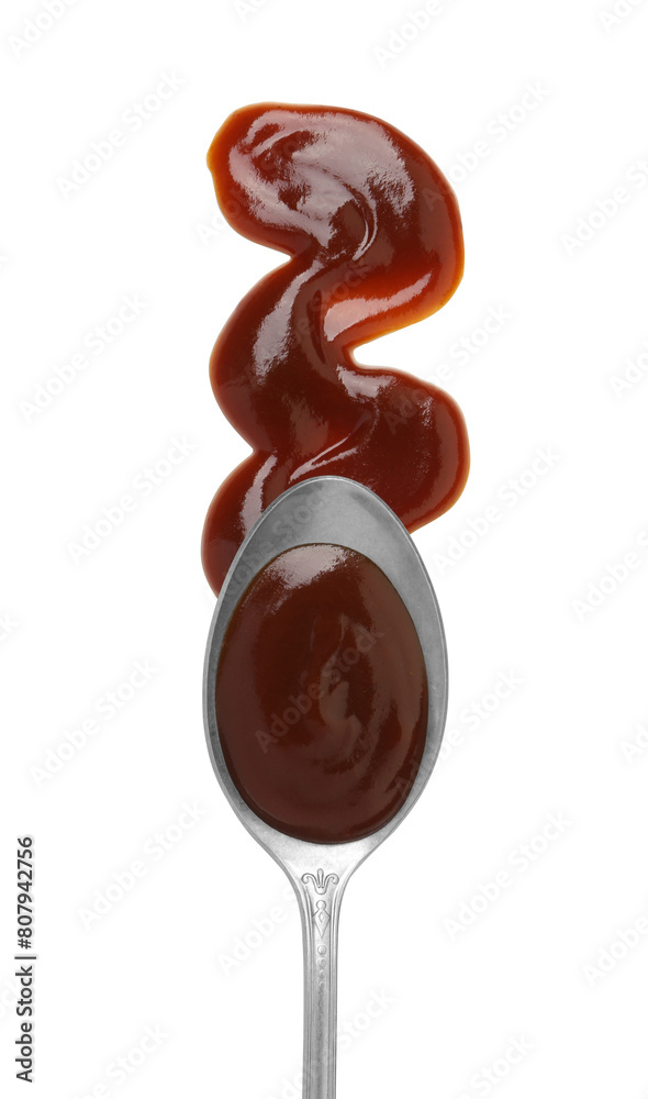 Obraz premium Tasty barbecue sauce and spoon isolated on white, top view
