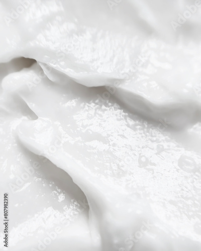 White cosmetic face mask texture close-up