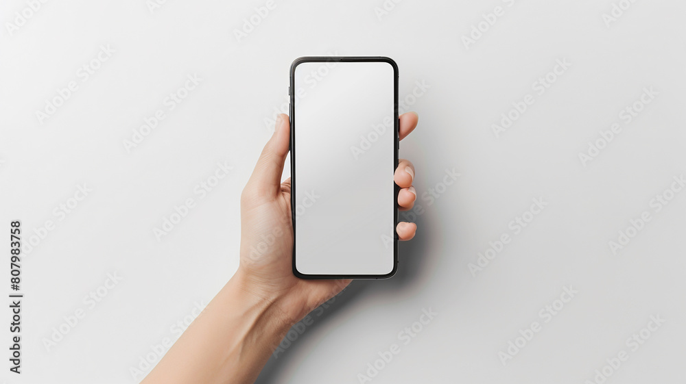 Hand holding a blank smartphone screen on a white background.