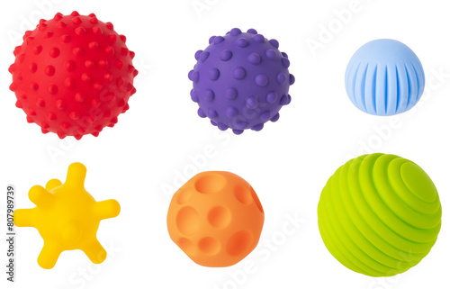 Colorful sensory balls for kids on a white background, designed to enhance cognitive and physical development. Tactics of a soft toys that stimulate children's.
