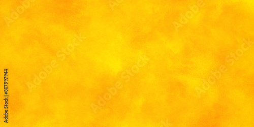 grunge bright abstract orange design paper textured, turmeric yellow or mustard yellow grunge texture, yellow or orange watercolor background texture with grunge effect.  © FLOATING HEART
