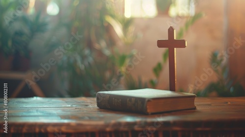 The wooden cross and the Bible on the table in the church photo