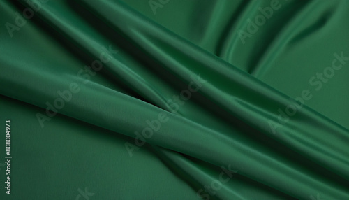 Emerald satin fabric background with copy space: a luxurious and elegant alternative