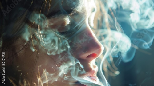 A person squinting from irritation caused by cigarette smoke, discomfort and annoyance photo