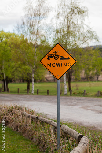 Mowing sign in permanent place in parkland
