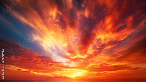 The sun is shining brightly in the sky, casting a warm glow over the clouds © wassana